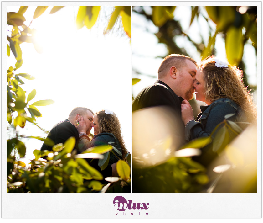 Ingrid and Chris have a romantic moment in the foliage at Huntington Beach.